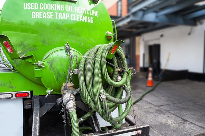 a pump truck emptying a grease trap in Avon CT