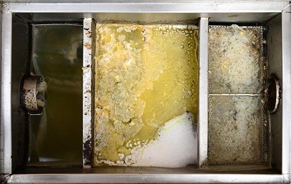 routine grease interceptor cleaning helps prevent obstructions and backups in your plumbing system