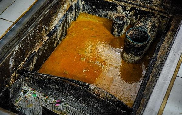 regular grease trap cleaning can help prevent plumbing issues such as clogs and backups